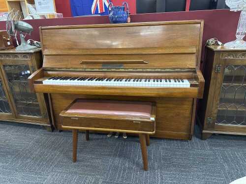Concord upright piano in timber case with stool