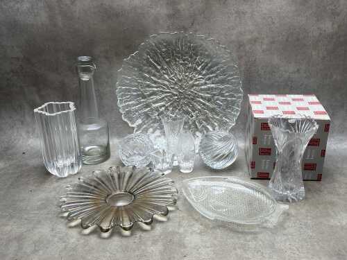 Crystal and glass tableware and decorative pieces include Kosta Boda