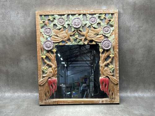 Hand carved timber wall mirror featuring floral and bird motifs