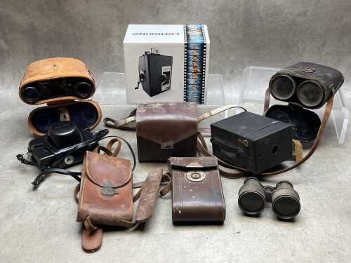 Assorted cameras and binoculars