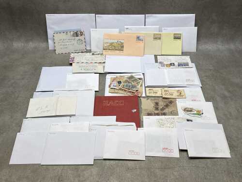 World envelopes and stamps on and off paper