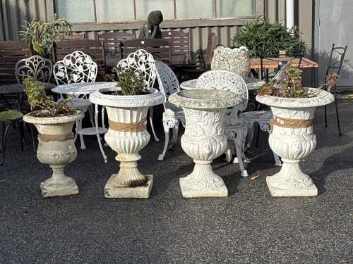 Four stone garden urns
