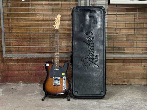 Fender Telecaster electric guitar in hard case