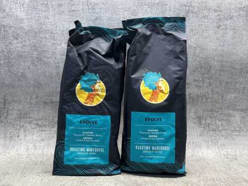 Two bags of Roasting Warehouse Evolve coffee beans