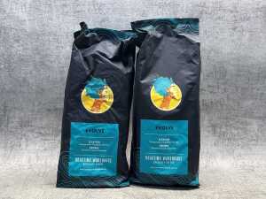 Two bags of Roasting Warehouse Evolve coffee beans