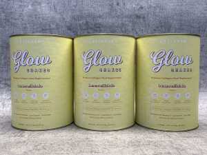 Three tins of The Collagen Co. Glow Shakes