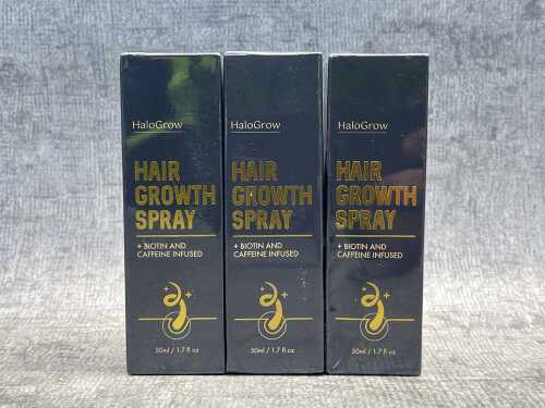 Three cans of HaloGrow Hair Growth Spray