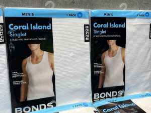 Six packs of Bonds Coral Island singlets size 18/L - 2