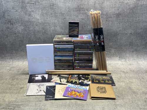 Group of mostly CDs