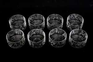 Eight Oiva Toikka for Nuutajarvi 'Flora' clear glass bowls