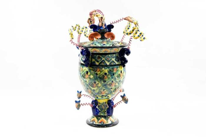 Catherine Lane, Diver's Urn, 1991. Ceramic urn with sprung sculptural divers, snakes and fish