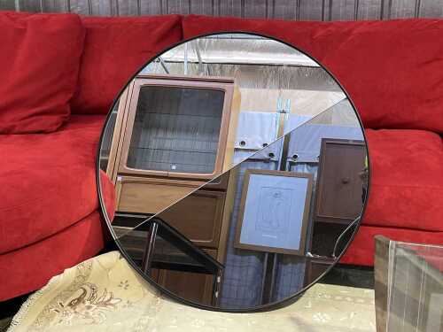 Contemporary round mirror in black frame