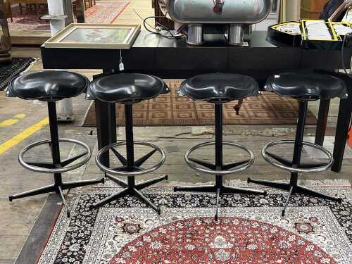 Set of four bar stools with motorcycle style seats