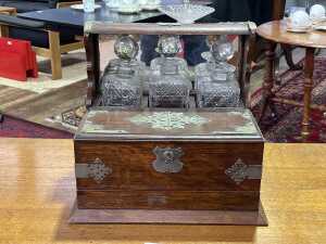 Antique oak tantalus with metal bindings and handles