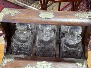 Antique oak tantalus with metal bindings and handles - 4