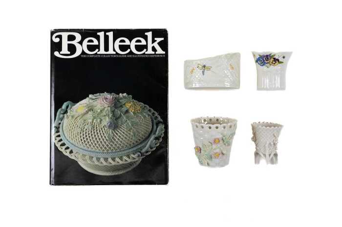 Four Belleek porcelain vases with a Belleek reference book
