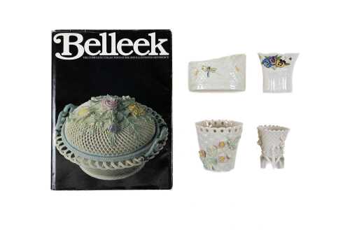 Four Belleek porcelain vases with a Belleek reference book