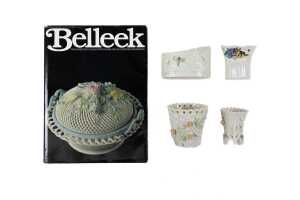 Four Belleek porcelain vases with a Belleek reference book