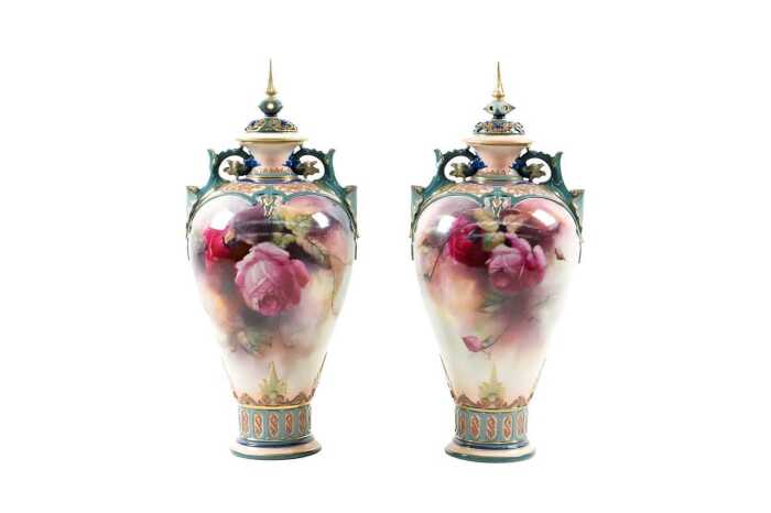Pair of Edwardian Royal Worcester Hadley Ware porcelain urns decorated by C.V. White