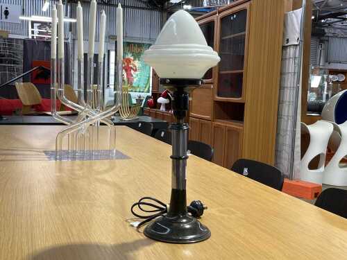 Art Deco table lamp with milk glass acorn form shade