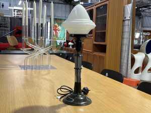 Art Deco table lamp with milk glass acorn form shade