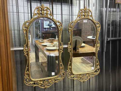 Pair of arched top bevelled glass mirrors