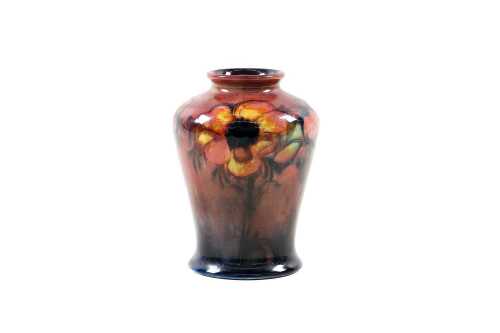 Moorcroft flambe 'Anemone' on graduated red to blue ground pottery vase