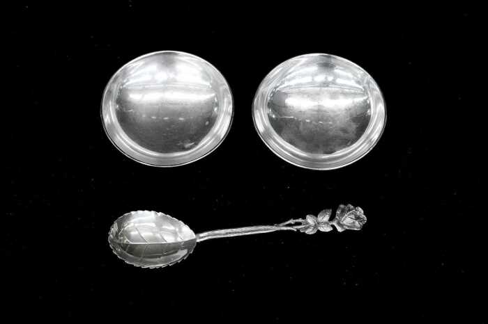 Pair of Australian sterling silver footed dishes, together with German 835 silver spoon