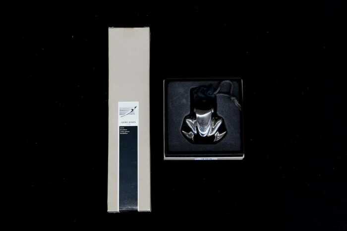 Georg Jensen Steve McGugen letter opener and Henning Koppel stainless steel frog paperweight