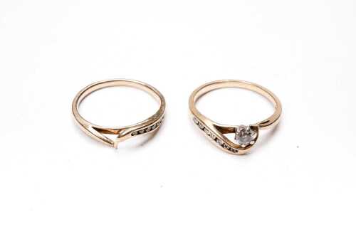 A diamond two ring set in 9 carat yellow gold