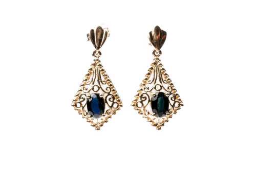 A pair of filigree sapphire drop earrings in 9 carat yellow gold