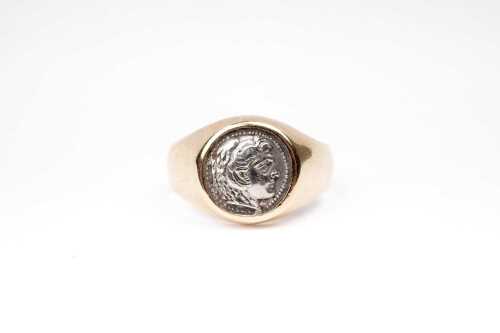 A Philip of Macedon coin signet ring in 14 carat yellow gold.