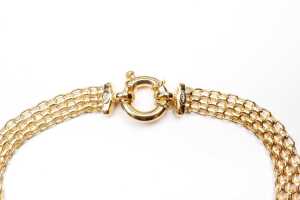 A mesh link bracelet in 9 carat yellow gold - 4
