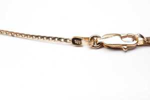 A synthetic emerald and diamond necklace in 9 carat yellow gold - 5