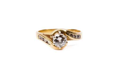 A diamond ring in 18 carat yellow gold