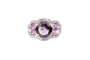 An amethyst and diamond ring in 14 carat yellow gold
