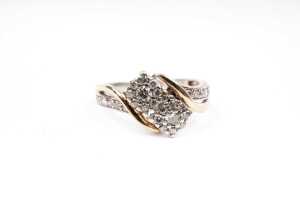A diamond ring in 10 carat yellow gold