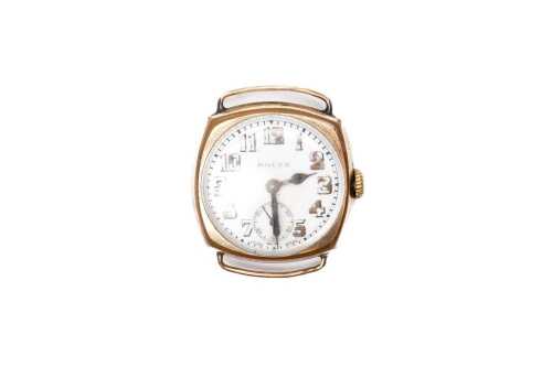 An antique rolled gold Rolex watch
