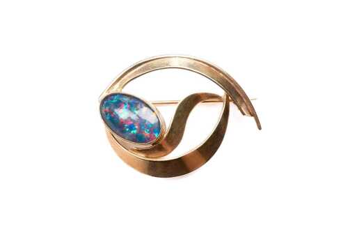 A vintage opal triplet brooch in 9 carat yellow gold