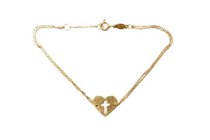A double strand heart and cross bracelet in 18 carat yellow gold