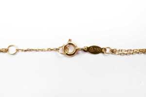 A double strand heart and cross bracelet in 18 carat yellow gold - 3