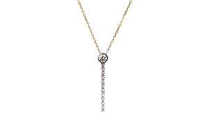 A diamond necklace in 18 carat yellow gold