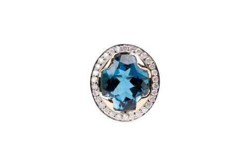 A Blue topaz and diamond ring in 14 carat yellow gold