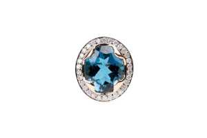 A Blue topaz and diamond ring in 14 carat yellow gold