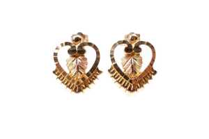 a pair of heart and leaf design earrings in 14 carat yellow gold
