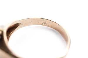 A sapphire and cubic zirconia ring in 9 carat yellow gold - 5