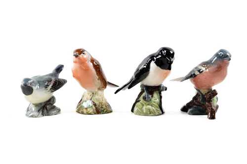 Four Beswick porcelain bird figures