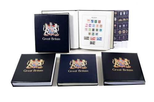 Great Britain stamp collection in five Davo albums with slip cases