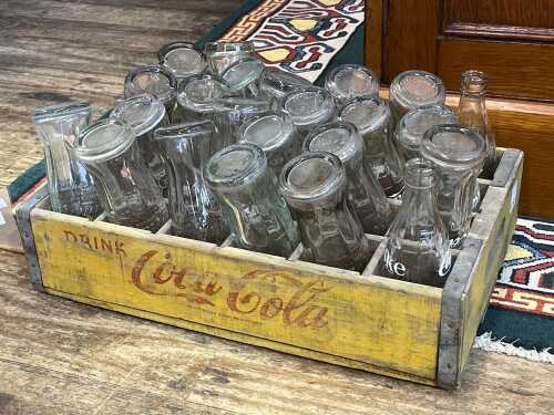 Collection of vintage glass Coca Cola bottles