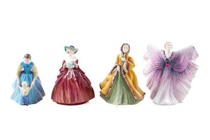 Four Royal Doulton lady figures